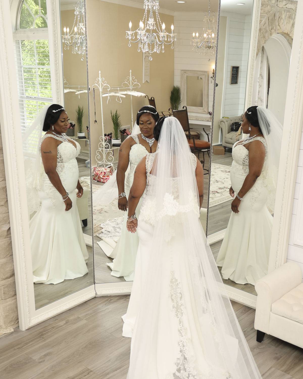 The bride in front of a mirror