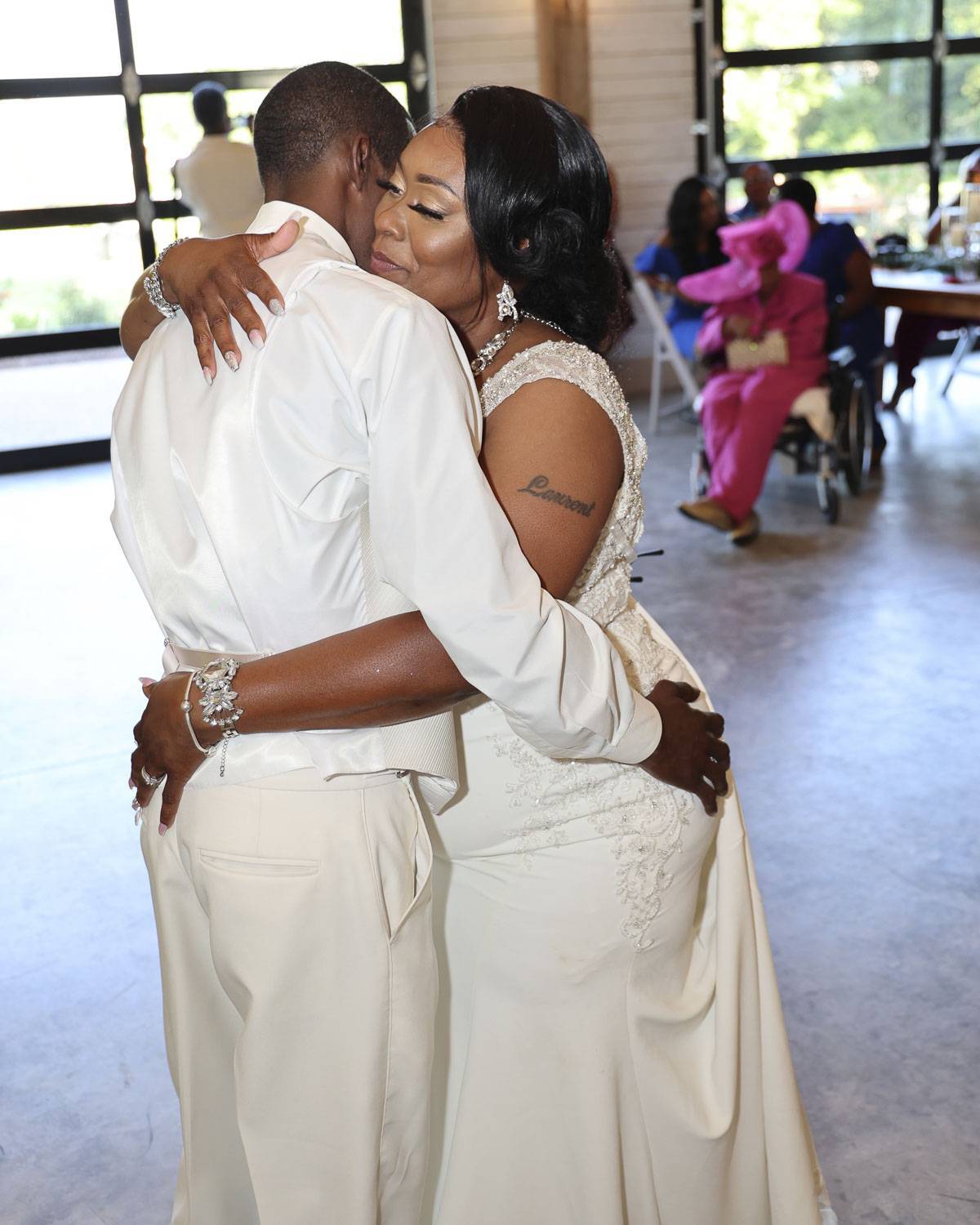 The bride and groom in an embrace