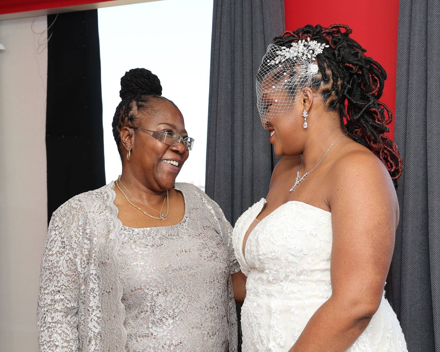 The bride and the woman smiling