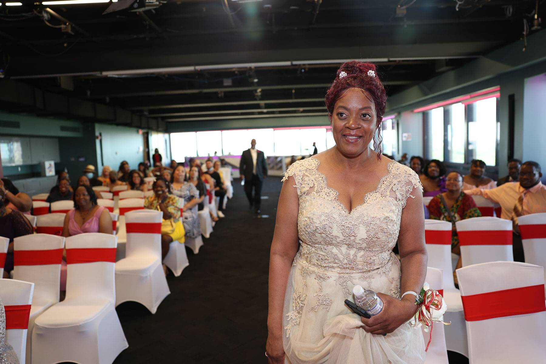 The mother of the bride at the aisle