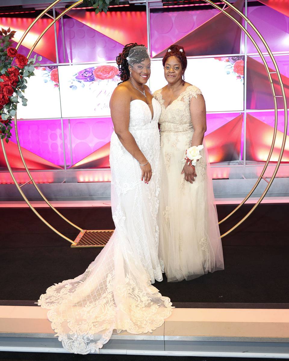 The bride with her mother on stage