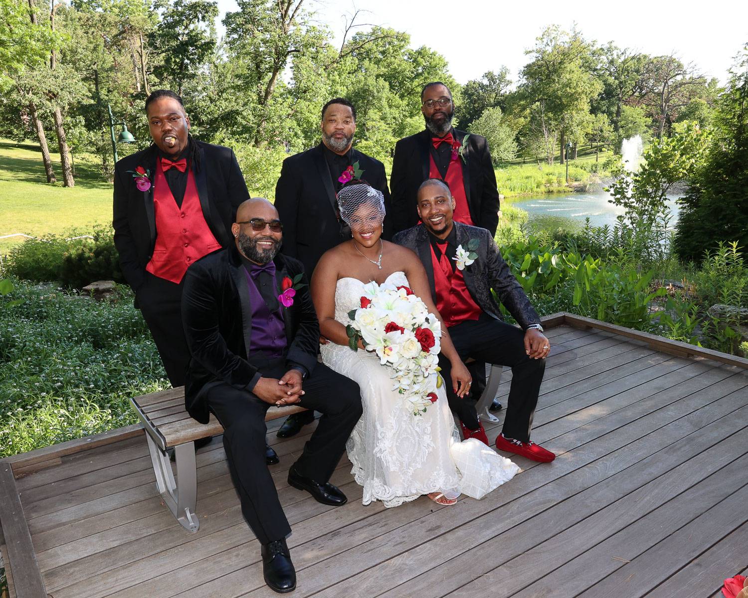 The newlyweds with the groomsmen
