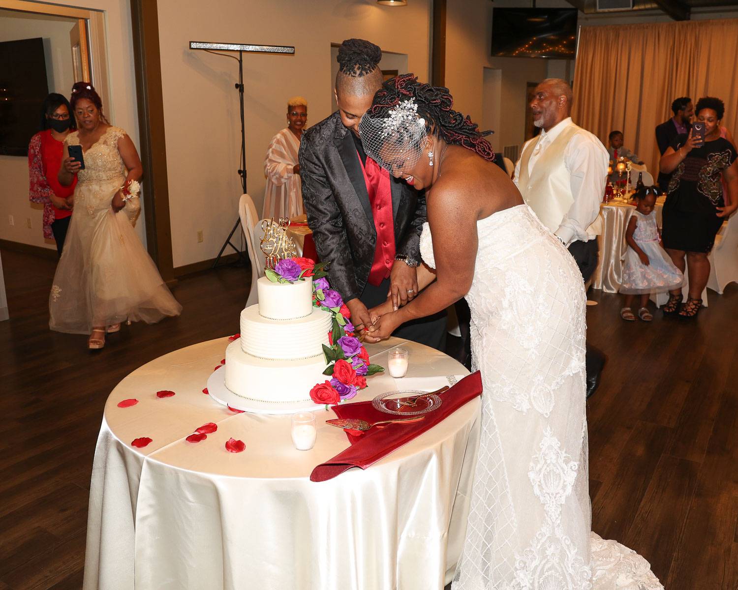 The newlyweds taking a slice