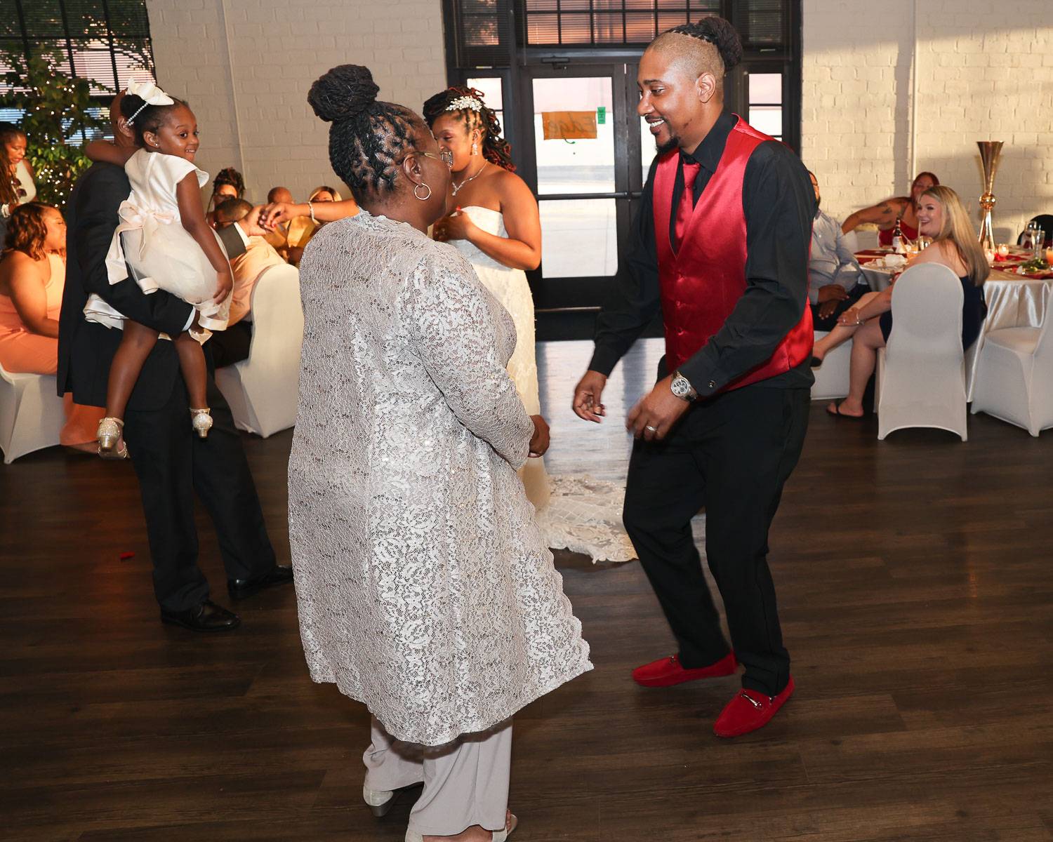 The groom dancing with his mom