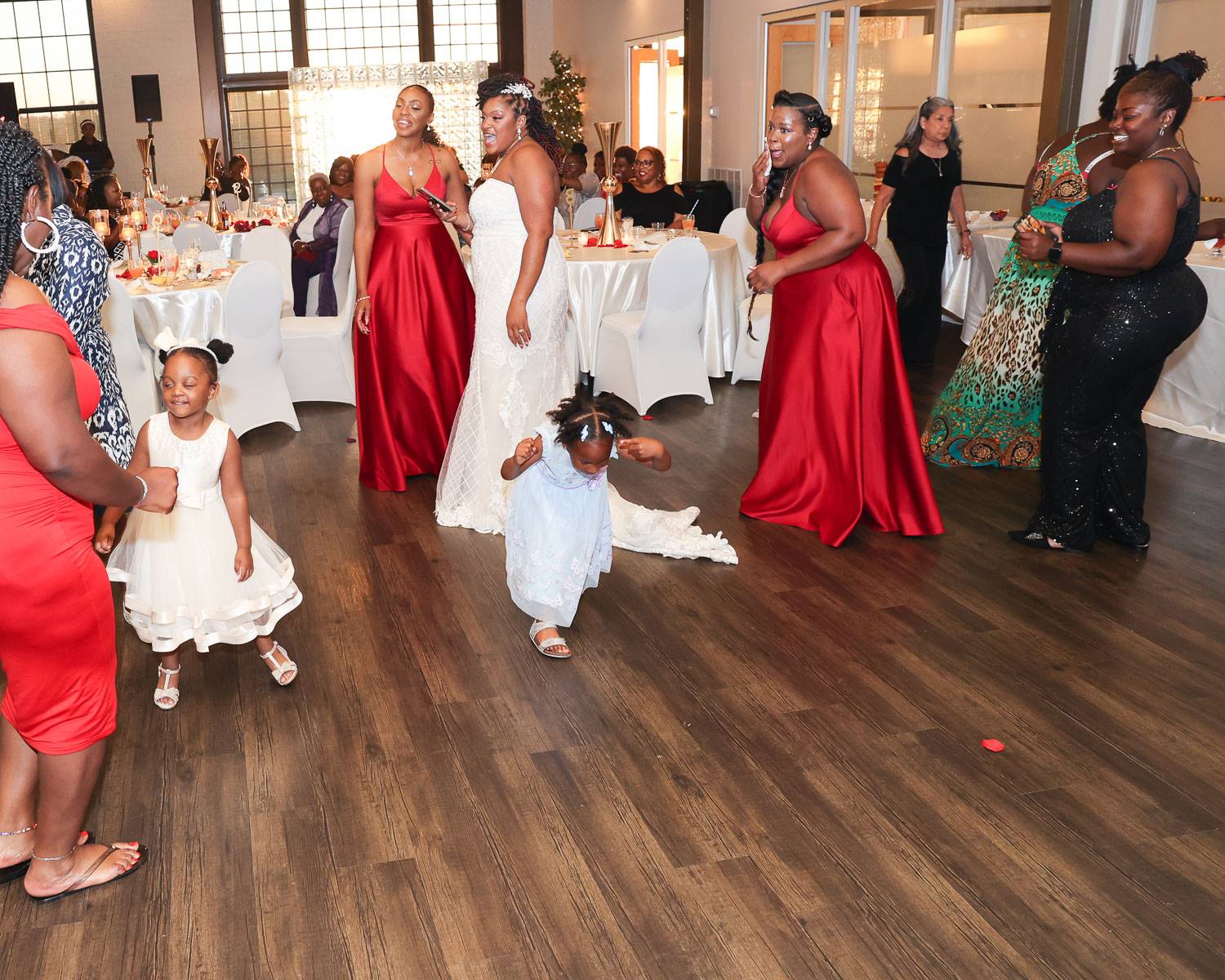 Girls dancing with the bridesmaids