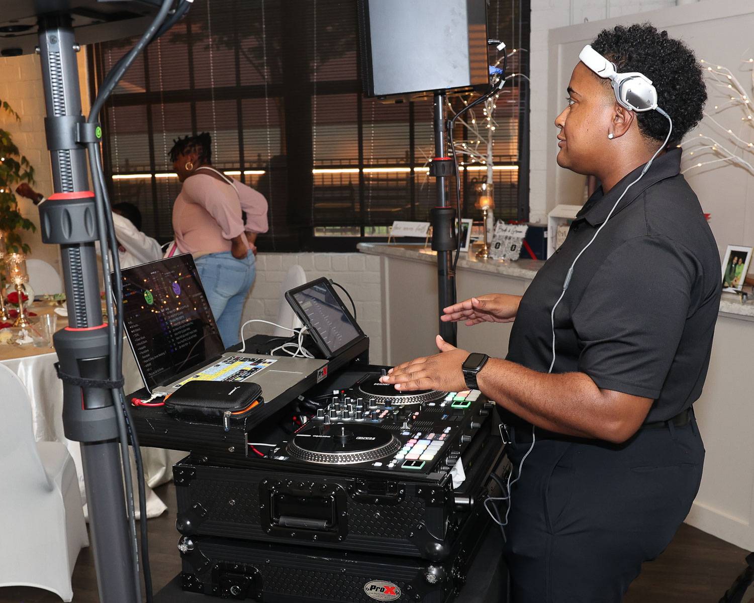 A DJ mixing the music