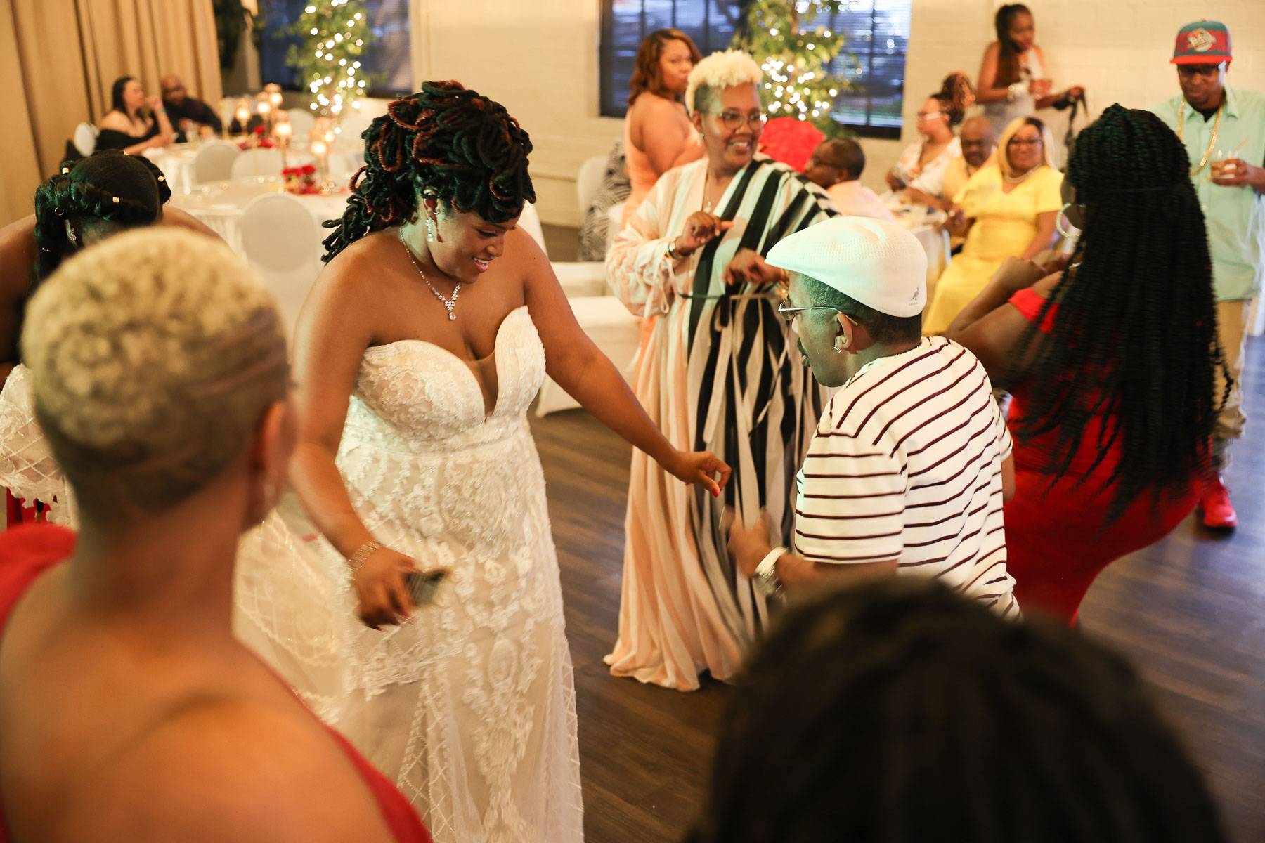 The bride dancing casually in her dress