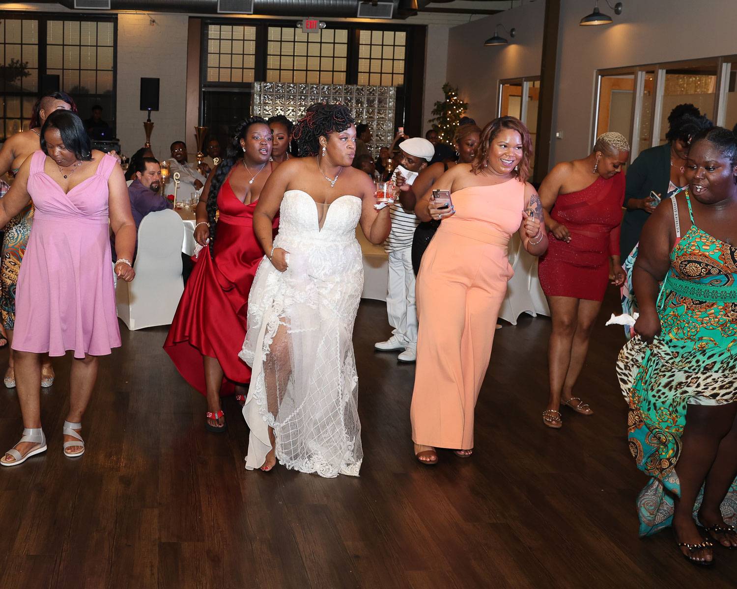 Guests and the bride dancing