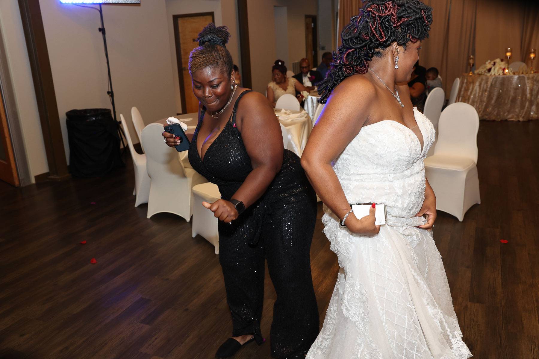 The bride dancing again with her guest