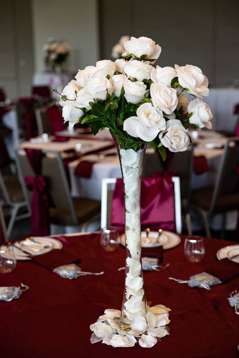 A bunch of white roses on a table