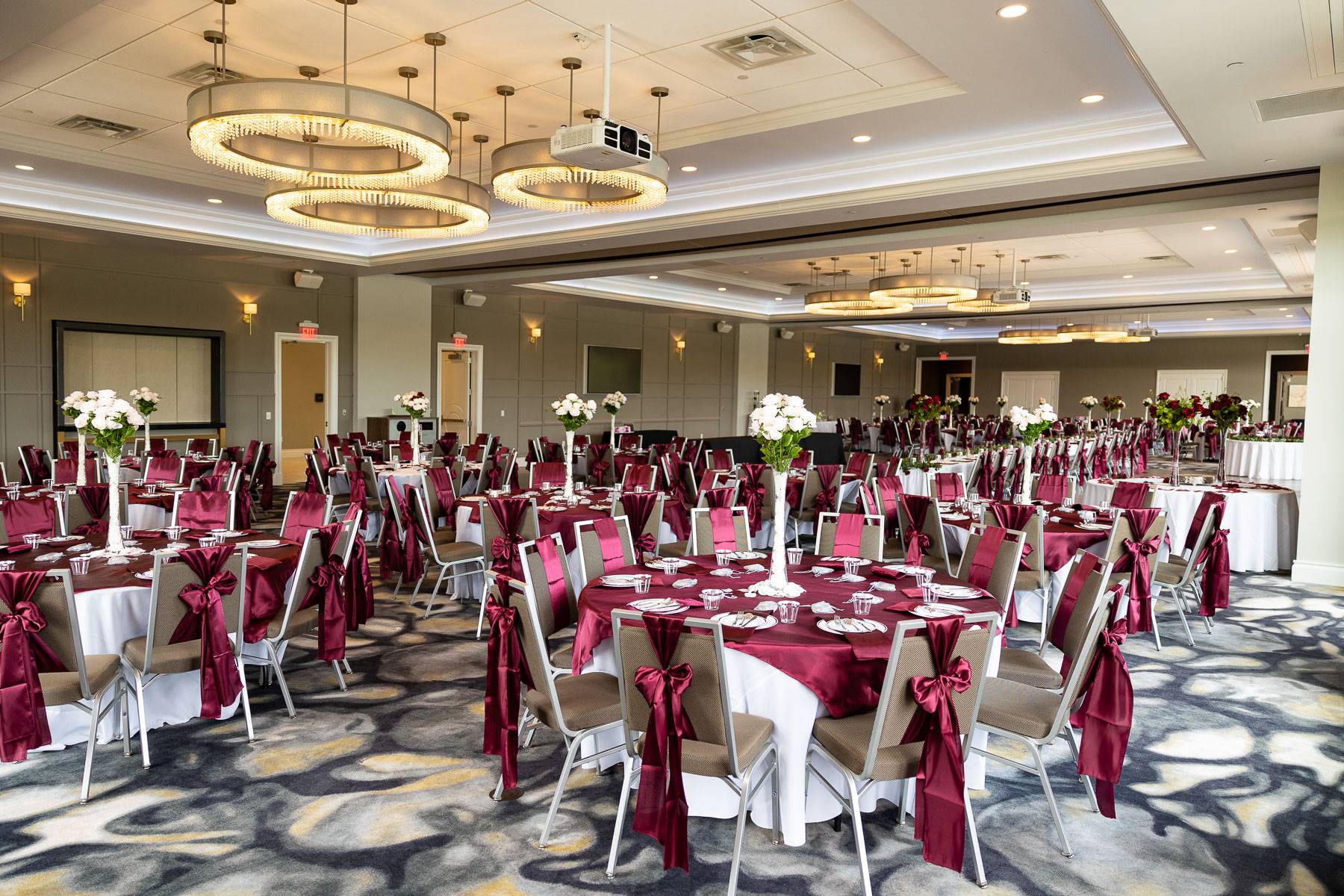 The wedding dining venue with red and white colors